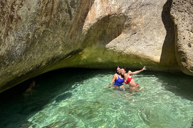 Blue Cave & Grama Bay Full Day Guided Boat Tour - Bristan Bay and the old military remains