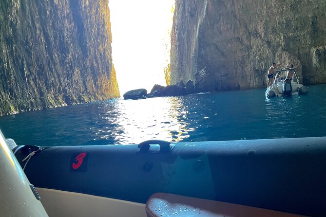Secret Blue Gem Cave & Grama Bay Boat Tours Vlore - Grama Bay and the inscriptions in the rock