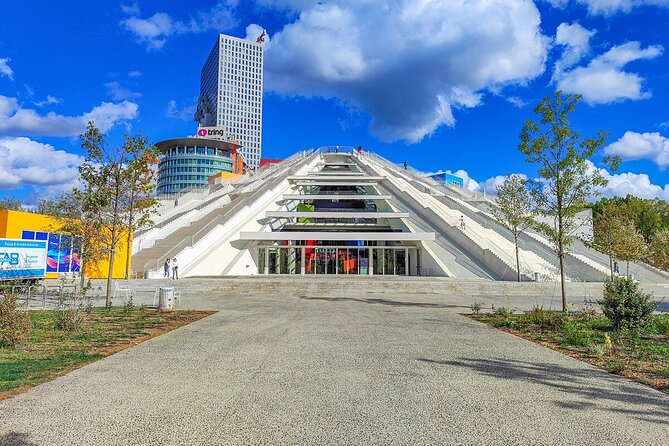 Tirana Bike Tour, History, Culture and Visit to Artificial Lake - Brigades Palace and the royal park on weekends