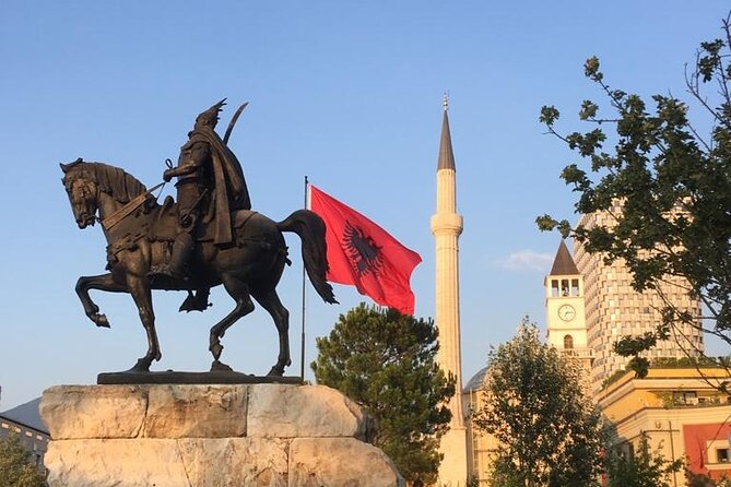 Tirana Express Walking Tour - Essential of the Albanian Capital - Komiteti Bar turns history into daily life